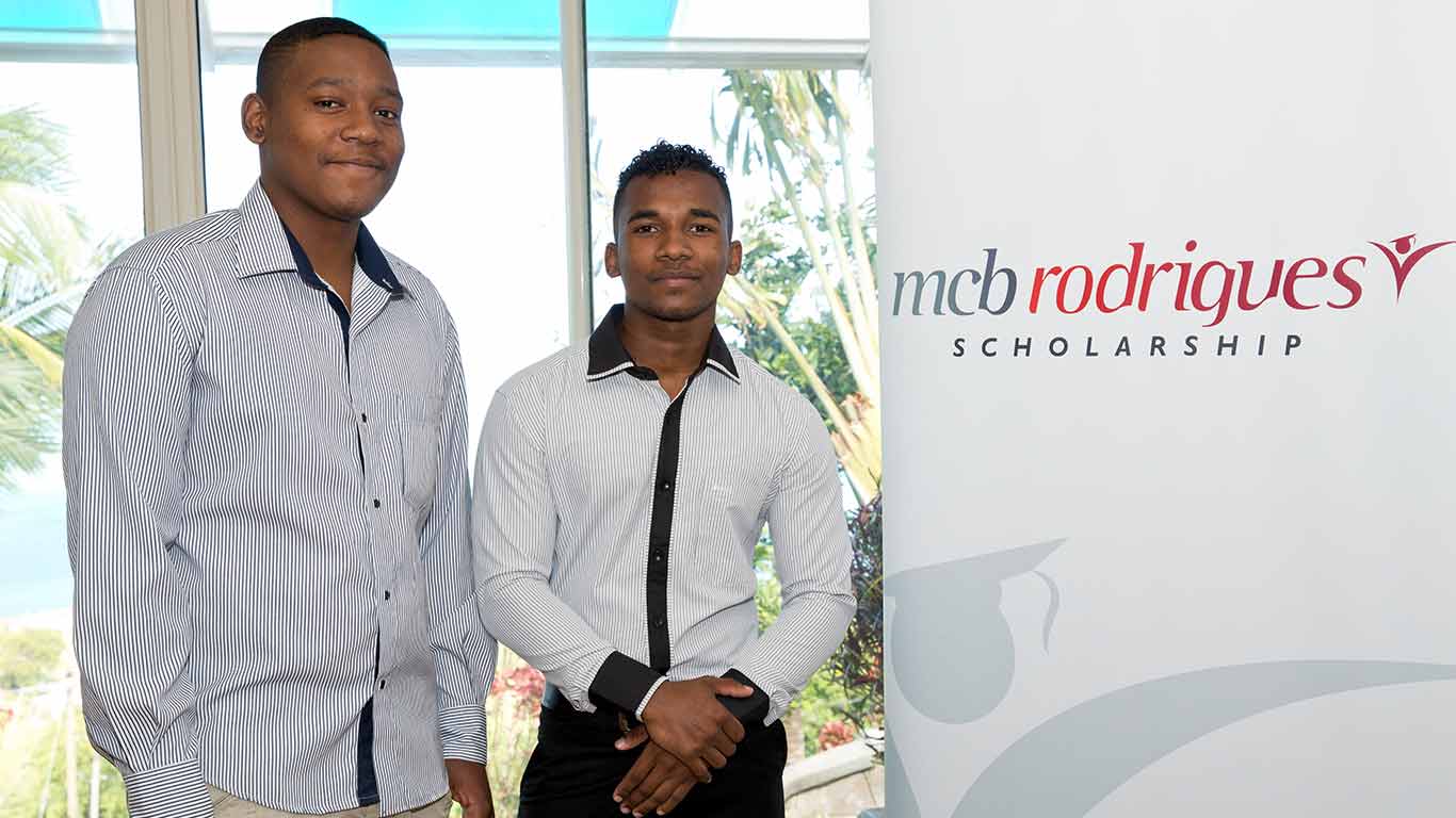 Two boys scholars posing for a photo